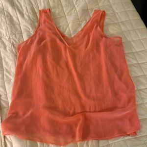 Women’s White House Black Market sleeveless top in tangerine.